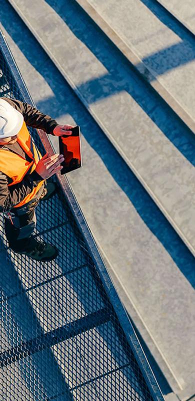 Construction worker on top of a building