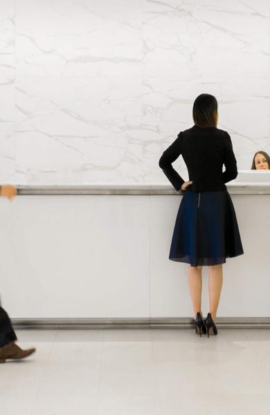 People gathered at reception desk