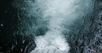 Aerial view of dam releasing water